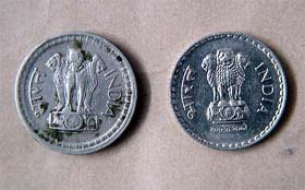 A fake coin of Rs 5 denomination having the national emblem on both sides