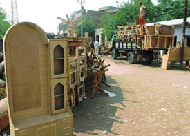 Furniture items being uploaded at Vishavkarma Market, Kartarpur