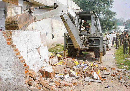 Encroachment on Defence land in Ambala cantonment being removed on Friday. 
