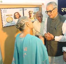 Vice-President Bhairon Singh Shekhawat talks to parents of Neerja Bhanot at the release of stamps in memory of Randheer Singh Verma and Neerja Bhanot at a function in New Delhi on Friday.