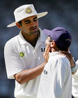 Zaheer Khan jokes with team-mate Parthiv Patel during the third days play of the first Test between India and Australia