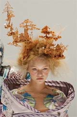A model wears a Chinese-style hair piece designed by British fashion designer Alexander McQueen