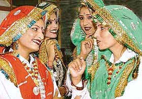 Haryanavi dancers strike a graceful pose before presenting their item at Sector 17 Plaza in Chandigarh