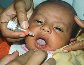 A month-old infant gets promised polio drops in Sector 27,