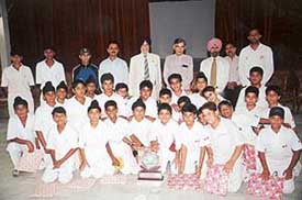 Cricket teams of Yadavindra Public School, Mohali, and Hansraj Public School, Panchkula, with Mr Pawan Bansal, MP, during the final of the St Kabir Trophy 