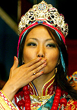 Ms Tashi Yangchen, the newly crowned Miss Tibet 2004, poses for photographers following her victory in Dharamsala on Sunday
