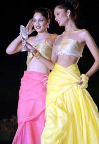 Models strike a pose during a fashion show at the Satluj Club in Ludhiana