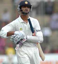 Rahul Dravid returning to pavilion after he got out LBW to Kasprowicz