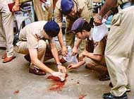 policemen collect blood samples