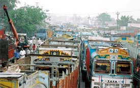 Trucks line up outside the dry port premises as work had to be suspended due to panic over bombs’ recovery from scrap