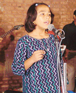 A participant at the Singer No 1 Muqabla 2004 contest held at Kala Gram, Mani Majra, on 