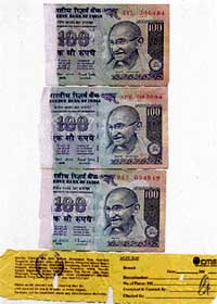 ‘Half’ notes found from a bundle of Rs 10,000