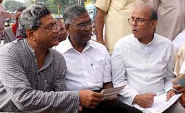 CPM leaders Sitaram Yechury and D. Raja with former Prime Minister V.P. Singh at a demonstration in New Delhi on Tuesday to protest against the shifting of small-scale and cottage industries in outer Delhi.
