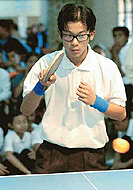 Rajneet of Shillong plays a forehand against Krishan Mohan of Hyderabad 