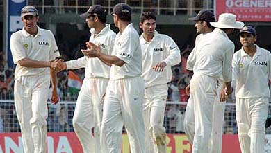 Anil Kumble being congratulated by his team-mates after he took seven wickets in Australia's first innings
