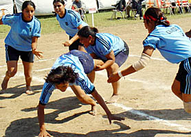 Eves of Chandigarh and Rajasthan in action during the 16th North Zone Inter-State Kabaddi Championship at Sector 17, Chandigarh, on Friday. 