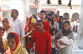 Devotees throng Mata Mansa Devi shrine to pay their obeisance on the second day of Navratras in Panchkula on Friday.