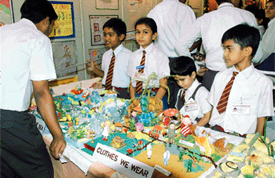 Students of KVM display exhibits at the annual exhibition held on the school premises