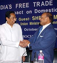 Union Minister for Commerce and Industry Kamal Nath with Assocham President Mahendra K. Sanghi at a seminar that discussed Indias FTA impact on domestic industry in New Delhi on Saturday. 