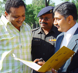 Former tehelka.com journalist Mathew Samuel (left) in discussion with the prosecution counsel, Arvind Moudgil, on his arrival to depose before a military court in Chandimandir on Saturday. 
