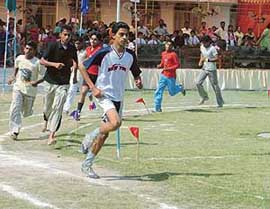 Mandeep leads the 800m race during the annual sports day of GMT Senior Secondary School in Ludhiana on 