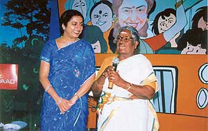 Suhasini Ratnam with an achiever in Theni