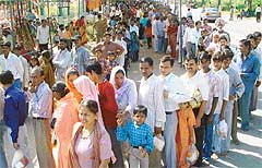 A long queue of devotees waiting for their turn at Mansa Devi shrine on the occasion of Navratras