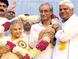 Delhi Chief Minister Sheila Dikshit being felicitated by Mahabal Mishra, MLA, at the annual function of Bihar-Uttar Pradesh Mahasabha in the Capital on Sunday