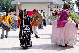 Artists perform at the Oasis craft fair near Karnal on Sunday