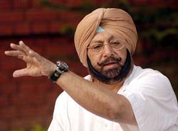 Punjab Chief Minister Amarinder Singh addresses a press conference at Kapurthala House in New Delhi on Sunday. 