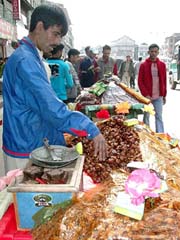 A Kashmiri vendor arranges dates 
