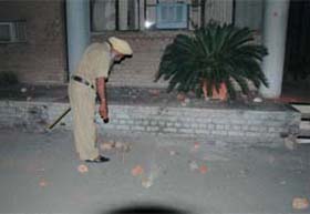 Policemen take stock of situation at the Thapar hall, PAU, Ludhiana