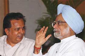 Prime Minister Manmohan Singh with ISRO Chairman G. Mdhavan Nair at the launch of village resource centre project developed by ISRO and the MSSRF in New Delhi on Monday. 
