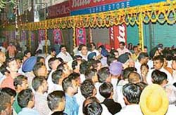 Sector 22 market shopkeepers after closing shops, protest against the removal of decorations by the Municipal Corporation in Chandigarh, on Tuesday. 
