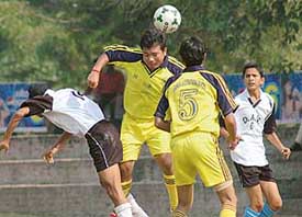 Players of DAV Senior Secondary School, Chandigarh, and Ganga International School, Delhi, in action during the CBSE North Zone Championship in Chandigarh on Tuesday. 