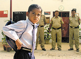 Rahul, ready for school, at Harsh Vihar Police Post in East Delhi