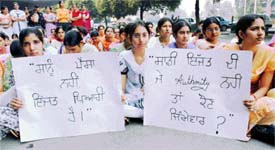 PAU student stage a dharna in front of Thapar Hall in Ludhiana on Tuesday