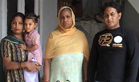 Surjit’s wife, Angrej Kaur, along with her son and grandchildren at her home in Faridkot.