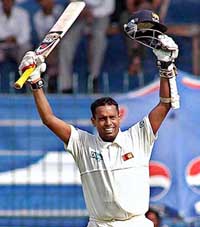 Thilan Samaraweera acknowledges his century against Pakistan during the second day of the first cricket Test in Faisalabad on Thursday.