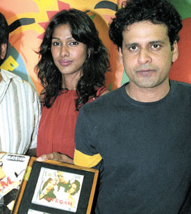 Actor Manoj Bajpai with Netra at the audio release function of the film Inteqam in the Capital on Friday.