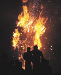 An effigy of Ravana goes up in flames at Ramlila Ground on Friday. 