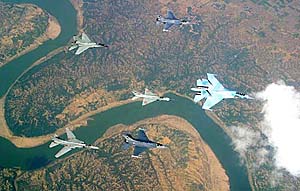 A Singapore F-16 flies with IAF aircraft