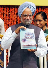 Prime Minister Manmohan Singh releases a book titled Department of Atomic Energy -- Our Collective Vision'  on the occasion of the launch of the commercial phase of Indias fast-breeder programme at the Indira Gandhi Centre for Atomic Research in Kalpakkam on Saturday.