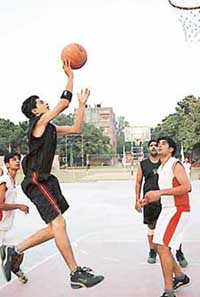 Cagers in action at the Rao Jai Singh Memorial Basketball Tournament in Sector 18, Chandigarh