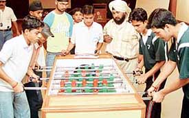 Teams of Haryana and Himachal Pradesh vie with each other in the first National Table Soccer Championship held at The Gurukul, Sector 20
