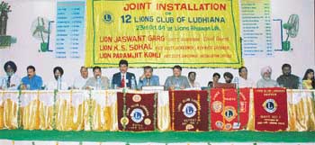 The joint installation of 12 Lions Clubs at Lions Bhavan in Ludhiana