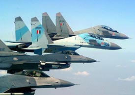 Indian Air Force MIG-29 and SU-30 multi-role fighter aircraft fly in formation with two F-16s of the Singapore Air Force during joint exercises in Gwalior.