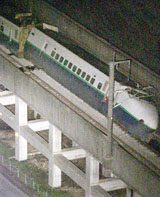 An aerial view shows a derailed bullet train near Nagaoka after a powerful earthquake hit northern Japan on Saturday