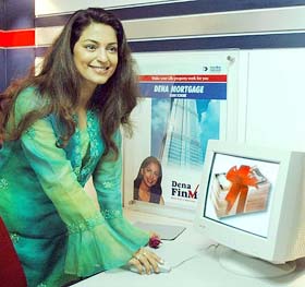 Bollywood actress Juhi Chawla inaugurates the first Dena Finmart, which is an exclusive outlet for all retail loans of the bank, in Mumbai on Monday. 