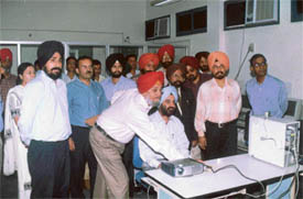 Prof Balwinder Singh, Principal of Government College, Sector 11, Chandigarh, explains a point to the UT Home Secretary